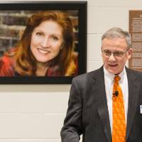 Dr. Danny Phipps speaking at the podium.